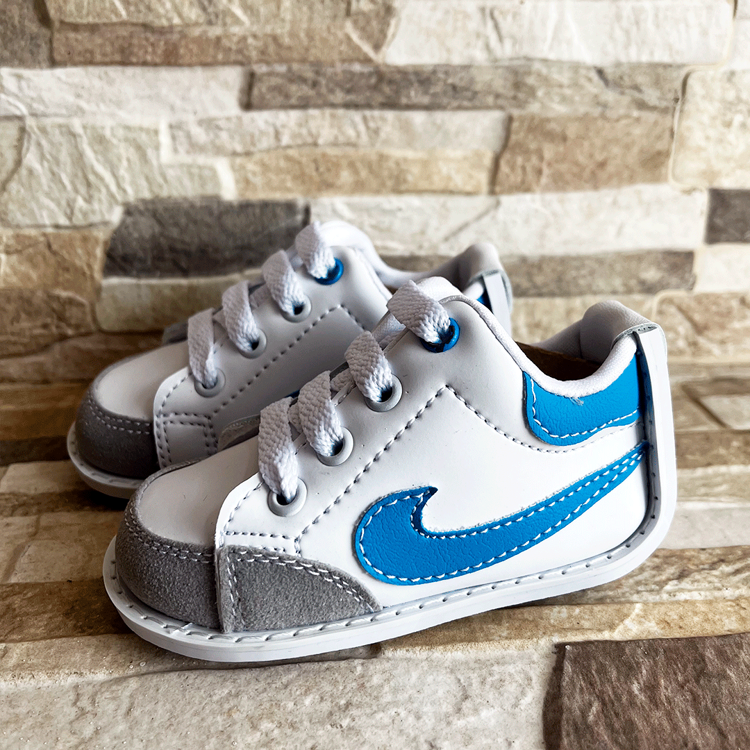 TENIS STAND NK BLANCO AZUL