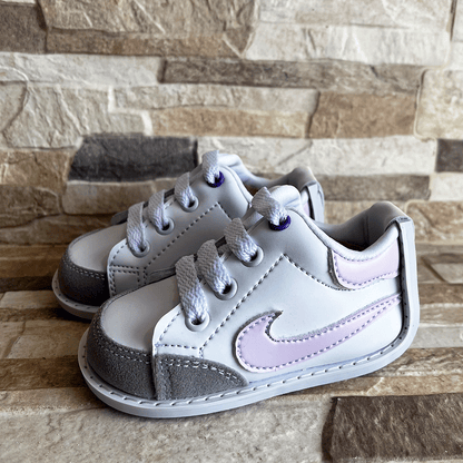 TENIS STAND NK BLANCO LILA